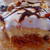 Raye's Signature 10" Turtle Cheesecake Pie Slice w/ Whipped Cream, Chocolate & Caramel Drizzle & Pecans - inside view