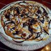 Raye's Signature 10" Turtle Cheesecake Pie w/ Whipped Cream, Chocolate & Caramel Drizzle & Pecans