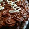 Raye's Signature 9" Chocolate Cake w/ Whipped Chocolate Buttercream Rosette Icing