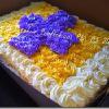 
Raye’s Signature ½ Sheet Key Lime Cake w/ Rosette Cross w/ Lime Cream Cheese & Whipped Cream Rosettes