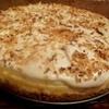 Raye's Signature 9.5" Coconut Lime Cheesecake w/ Coconut Whipped Cream & Toasted Coconuts