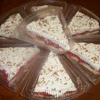 Raye's Signature Cherry Cheesecake Slices w/ Rum Whipped Cream & Chopped Pecans