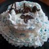 Raye's Signature Mini 4" White Almond Bundt Cake w/ Whipped Almond Cream Cheese Frosting, Blue Sprinkles & Chocolate Writing